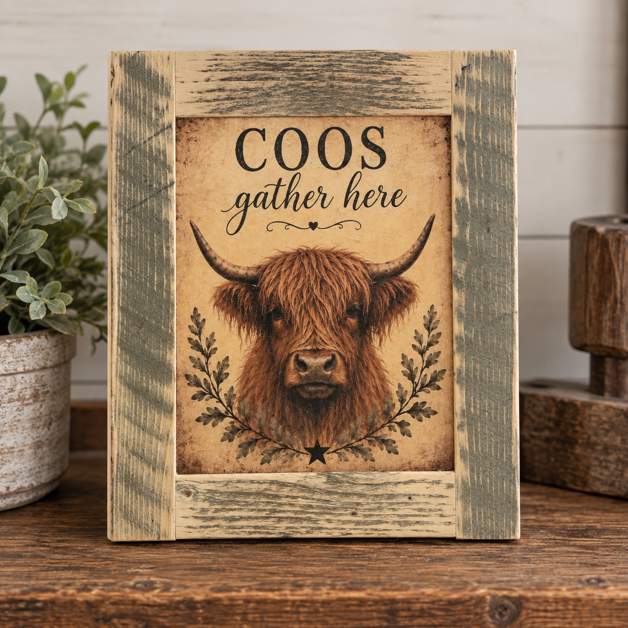 Timber & Grace handcrafted “Coos Gather Here” framed art shown in assorted golly of distressed gray.