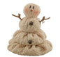 A beige, freestanding, plush snowman with three-dimensional features, including eyes, nose, and buttons. Its arms are made of twigs and it has a weighted body.