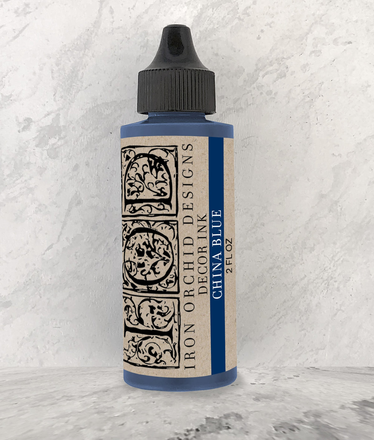 A 2oz bottle of Iron Orchid Design decor ink in China Blue color.