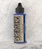 A 2oz bottle of Iron Orchid Design decor ink in China Blue color.
