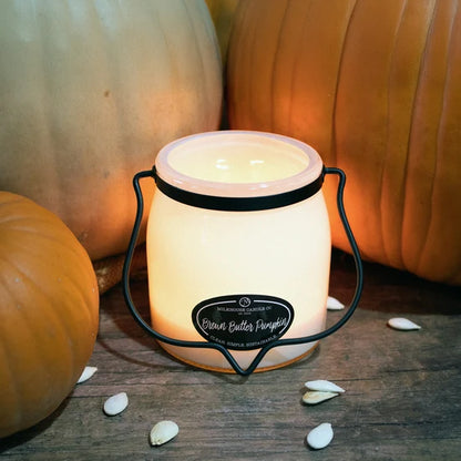 Milkhouse Brown Butter Pumpkin Candle in 16oz butter jar in fall display. 
