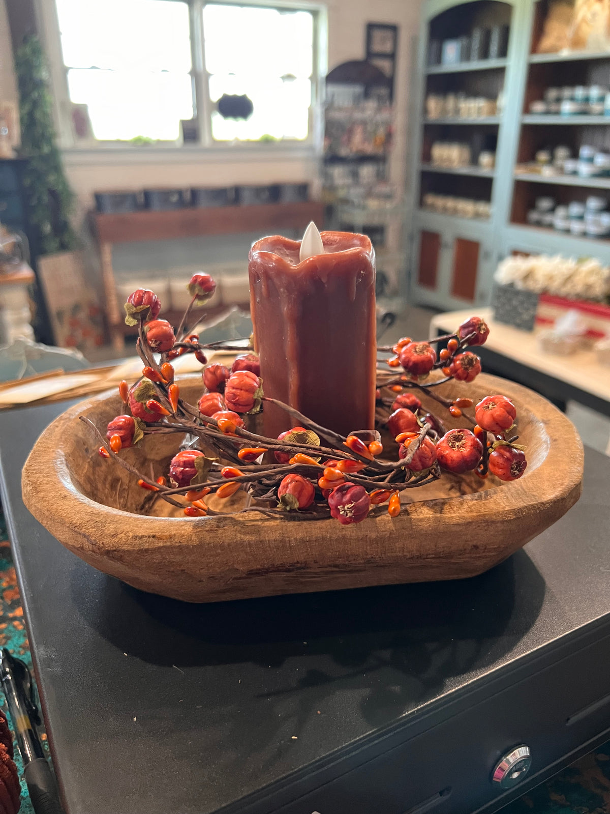 Podka & pip Berry candle ring displayed in a small dough bowl with timer candle.