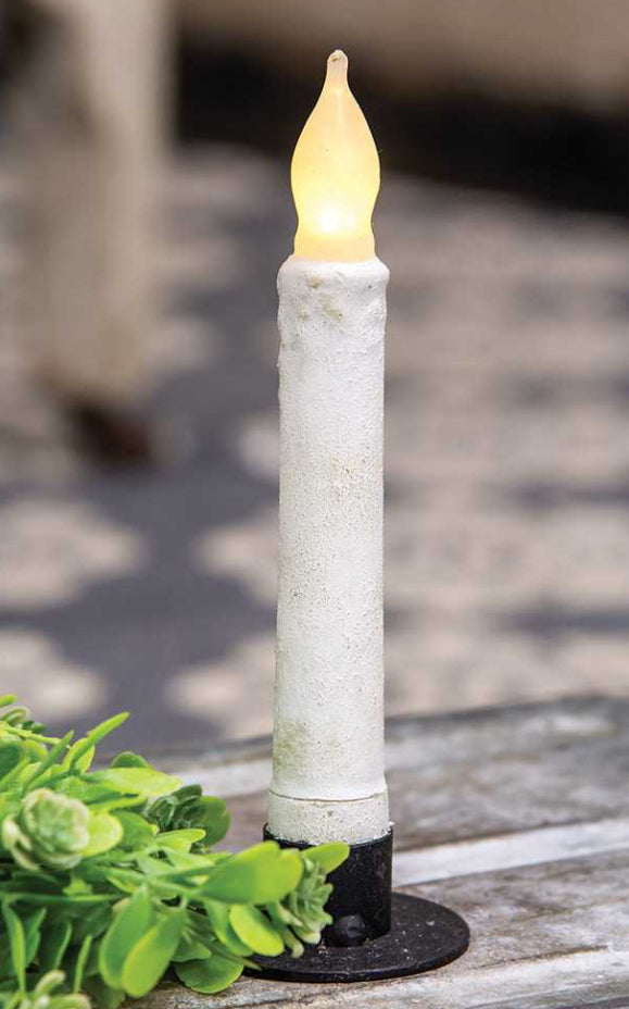 Cement look taper operates with two AA batteries (not included). Measuring 6” high, it has a cement-like finish and color that gives it a classic look.