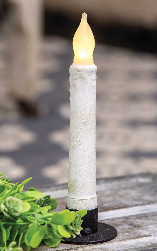 Cement look taper operates with two AA batteries (not included). Measuring 6” high, it has a cement-like finish and color that gives it a classic look.
