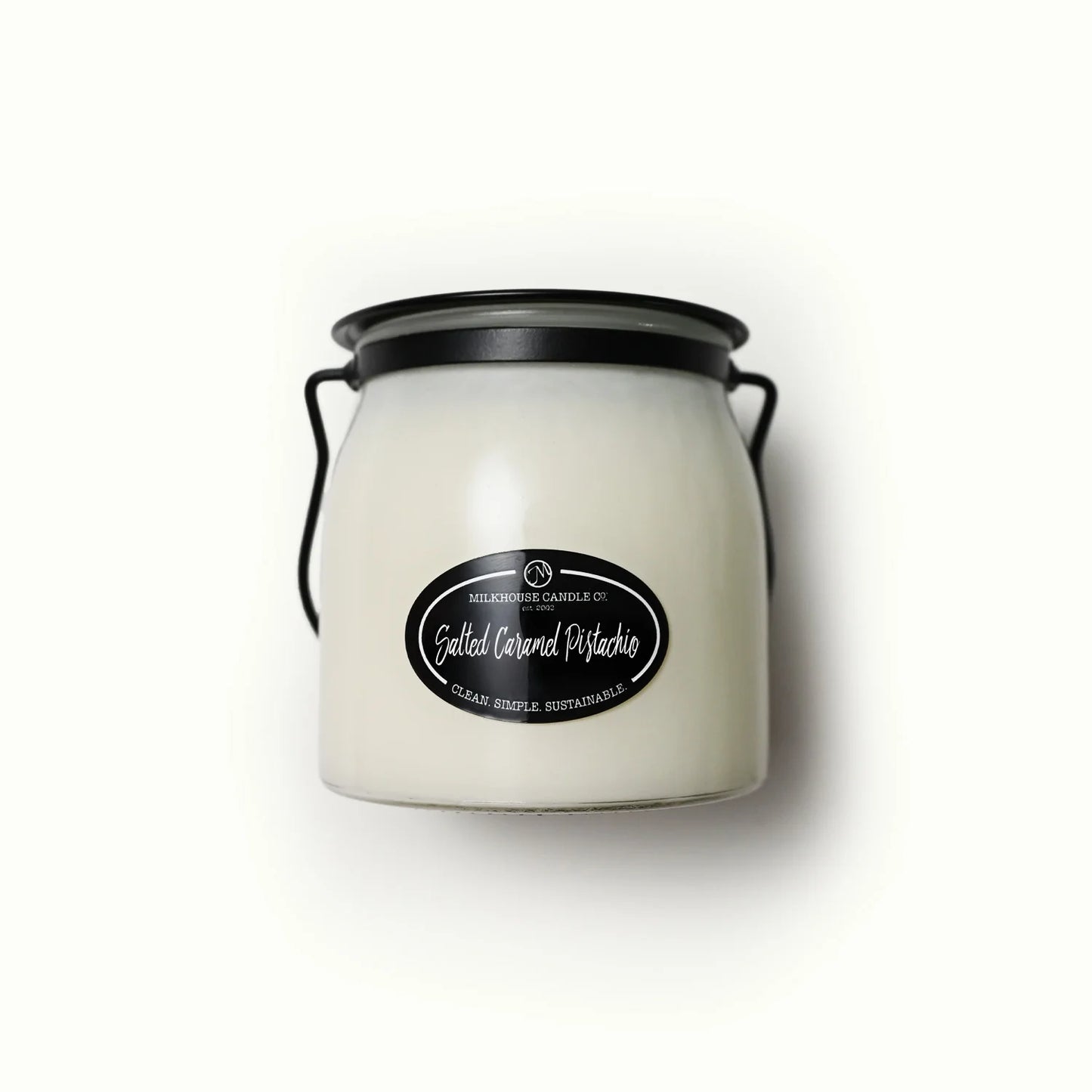 Close-up of 16 oz Salted Caramel Pistachio candle and label.