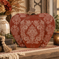 Warm fall color meets beautiful boho-inspired detail in this handcrafted wood pumpkin.